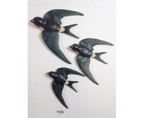 A vintage set of three graduated plaster wall swallows, largest 15cm long 
