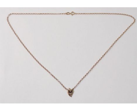A 9 carat gold pendant on 9 carat gold chain, 2.4g 