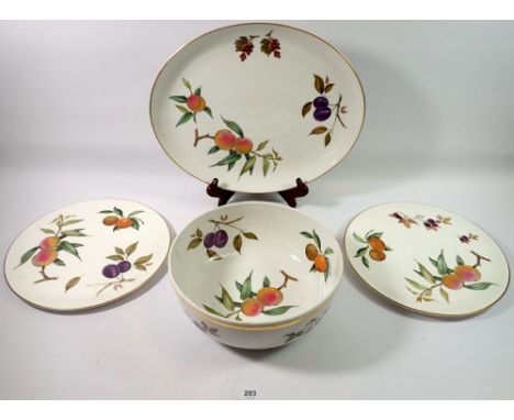 A Royal Worcester Evesham serving bowl, two cake plates and a meat plate, 38cm 