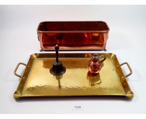 A copper plant trough 38cm long, a brass hammered tray, a miniature gurnsey and a brass bell 
