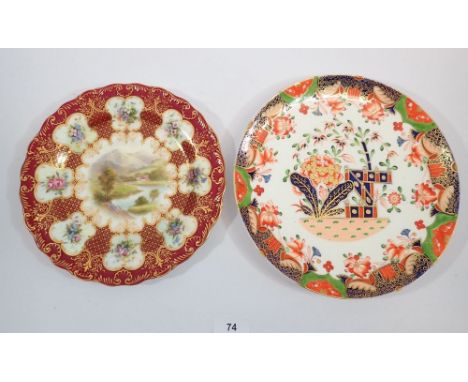 A 19th century Worcester plate painted landscape within floral border 22cm and an early 19th century Imari style Spode plate 