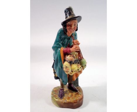 A Royal Doulton figure 'The Mask Seller' HN2103 