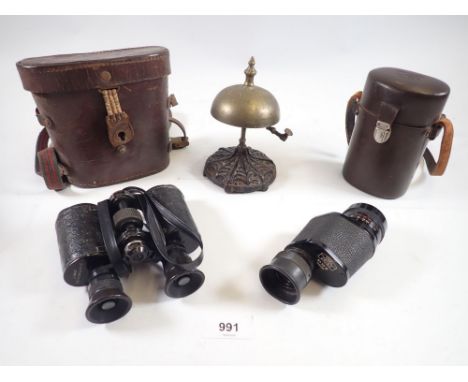 A brass table bell, pair of Lumex binoculars and a Carl Zeiss 8 x 30 monocular 