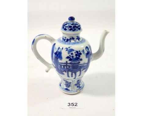 An 18th century Chinese blue and white wine pot, Kangxi period, 13cm tall 