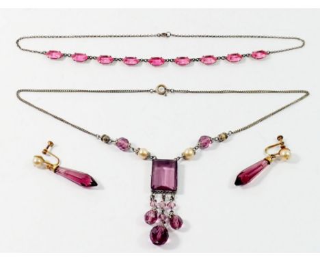 A vintage purple paste and simulated pearl necklace and earrings set place a pink paste necklace 