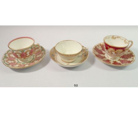 A Royal Crown Derby early 19th century cup and saucer with gilt leaf and orange dot design and two Davenport cabinet cups and