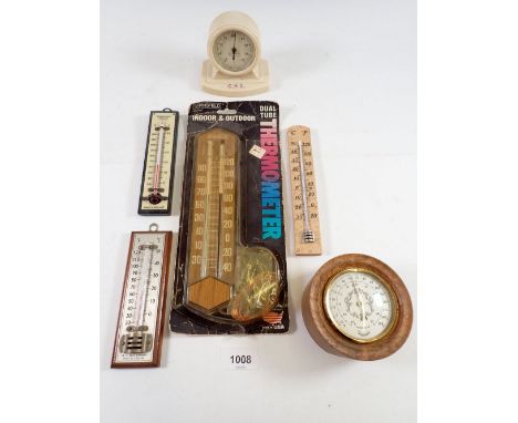 A group of six thermometers including vintage Bakelite example and an indoor/outdoor thermometer etc. 