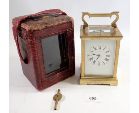 A brass carriage clock retailed by Marcks &amp; Co Ltd, Bombay, presented to Mr Chatterton in Nagpur 1926, with repeater in f