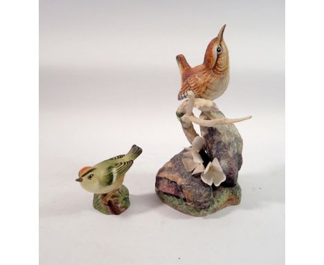 A Hereford Fine China bisque wren group, 17cm tall and a Royal Worcester goldcrest 
