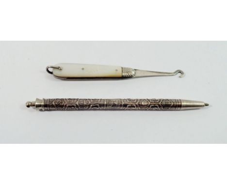 A 925 silver Jewish propelling pencil with Hebrew text and Hanuka candle decoration, plus a silver and mother of pearl button