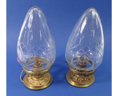 A pair of cut glass pear drop light fittings with gilt metal fittings, 24cm 