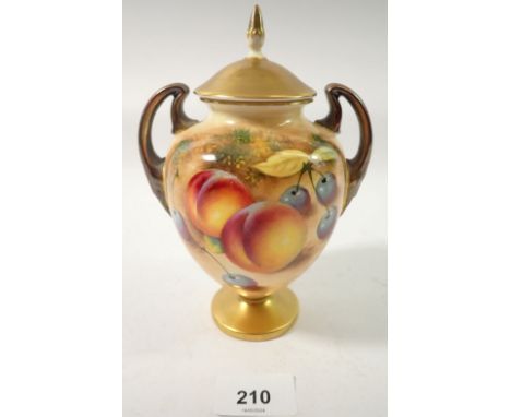 A Royal Worcester two handled urn form vase and cover painted fruit by Roberts, 17cm tall 