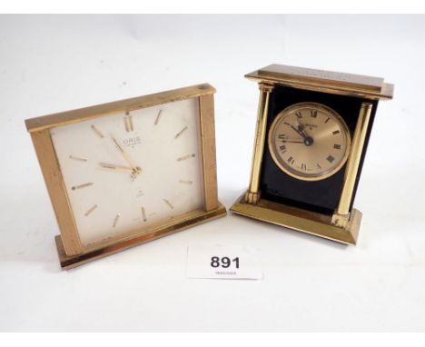 A Swiza 8 day vintage clock with alarm in gilt case plus an Oris 8 day gilt bedside clock with alarm 