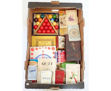 A box of vintage games including a set of children's snooker balls, bridge, Bezique, Solitaire etc. 