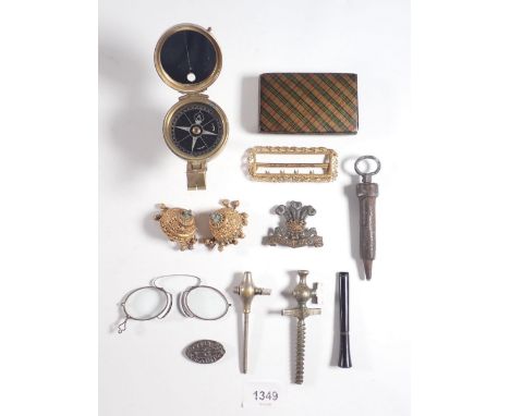 A box of collectables including compass, Royal Hussars cap badge, Tartanware box 