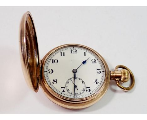 A Swiss jewelled rolled gold full hunter pocket watch in a Dennison case with Arabic dial 