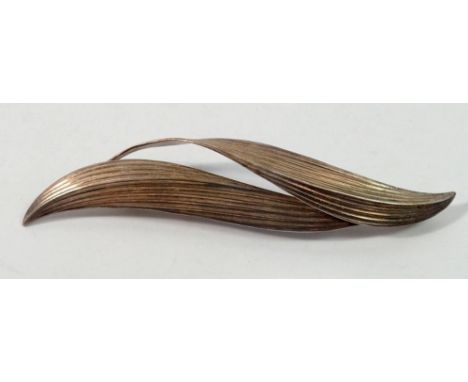 A Christian Dior silver plated leaf form brooch, 93m 