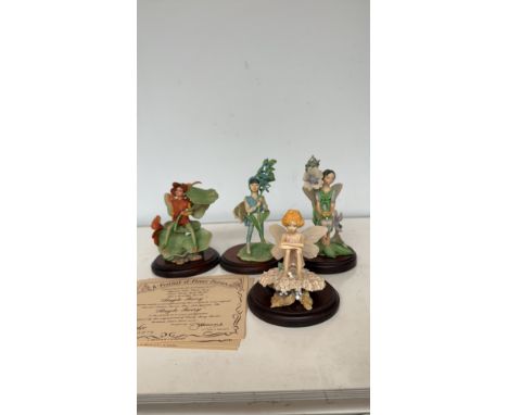 Set of four limited edition Border Fine Arts "Festival of Flower Fairies" figurines, inspired by Cicely Mary Barker's artwork