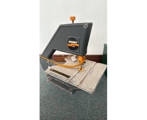 Burgess BK3 vintage electric bandsaw. Compact, workshop-ready design with sturdy metal construction.						