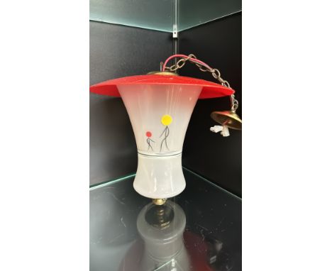 Mid-century modern frosted glass pendant light with red metal shade features minimalist stick-figure design with colorful acc