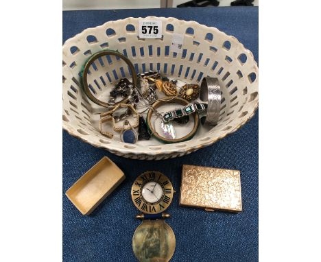 A FRENCH PORCELAIN BASKET OF DRESS JEWELLERY, LADYS WRISTWATCHES AND A CARTIER TRAVEL CLOCK