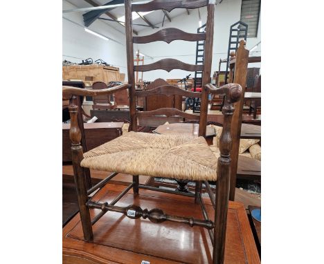 A 19th C. LADDER BACK CHAIR 