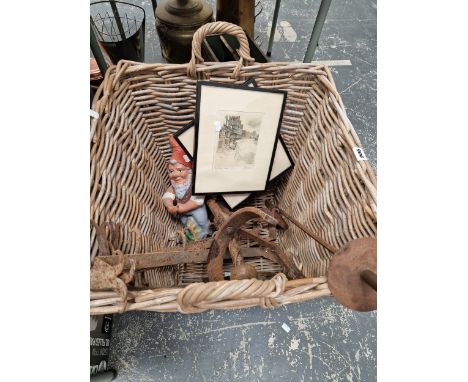A LARGE LOG BASKET, PAIR OF FIRE DOGS, WROUGHT IRON HOOKS AND A GARDEN GNOME, AND TWO PRINTS