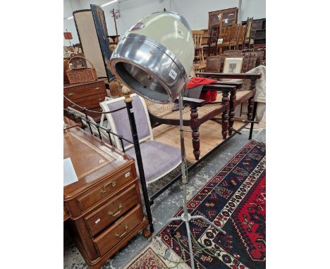 A MID CENTURY ALLOY HEAT LAMP CONVERTED AS A LIGHT. 