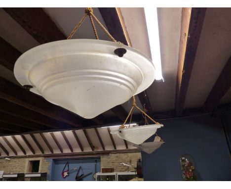 A SET OF THREE FROSTED GLASS CEILING LIGHT SHADES, THE INVERTED CONICAL SHAPES WITH BROAD RIMS.   Dia. 35cms.