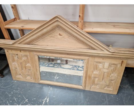 AN ARCHITECTURAL PINE FRAMED MIRROR. 