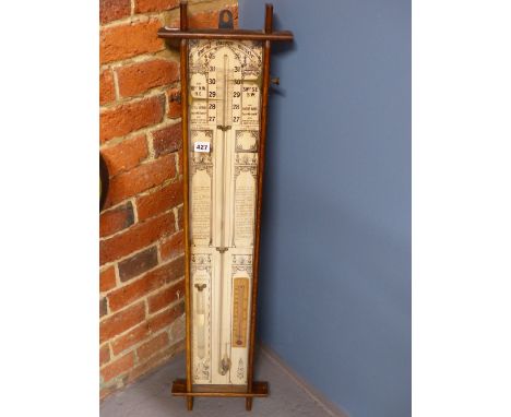 AN OAK CASED ADMIRAL FITZROY BAROMETER WITH A PAPER SCALE AND INSTRUCTIONS