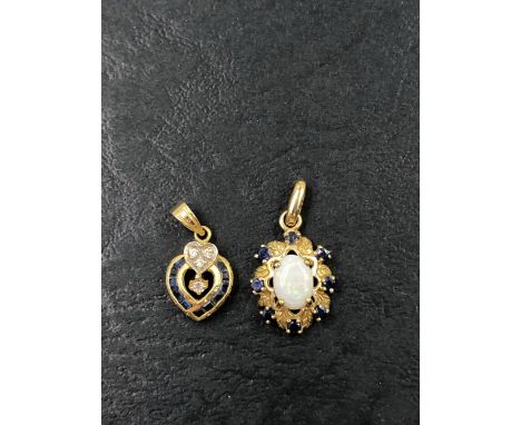 A 9ct HALLMARKED GOLD OPAL AND SAPPHIRE CLUSTER PENDANT TOGETHER WITH A SAPPHIRE AND CZ PENDANT STAMPED 585 ASSESSED AS 14ct 