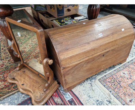 A VICTORIAN SWING MIRROR AND A DOMED TOP TRUNK. 