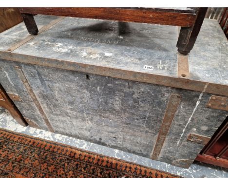 A LARGE IRON BOUND PINE TRUNK. 