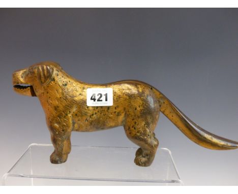 A GOLD PAINTED IRON CANINE FORM NUT CRACKER, 