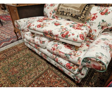 A GOOD QUALITY ANTIQUE STYLE TWO SEAT SOFA AND MATCHING FOOTSTOOL. 