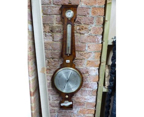 A CAPELLA MAHOGANY BANJO BAROMETER WITH AN ALCOHOL THERMOMETER ABOVE THE SILVERED DIAL, ADJUSTMENT KNOB AND SPIRIT LEVEL