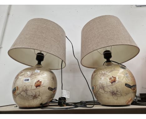 A PAIR OF SPHERICAL CERAMIC TABLE LAMPS DECORATED WITH BIRDS, BUTTERFLIES AND FLOWERS