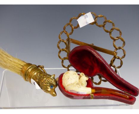 A BRUSH WITH A BRASS FOX HEAD HANDLE, A BRASS FRAME AND A CASED MEERSCHAUM PIPE CARVED WITH A HARE