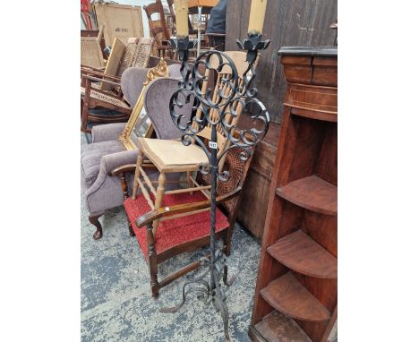 A WROUGHT IRON LAMP STAND