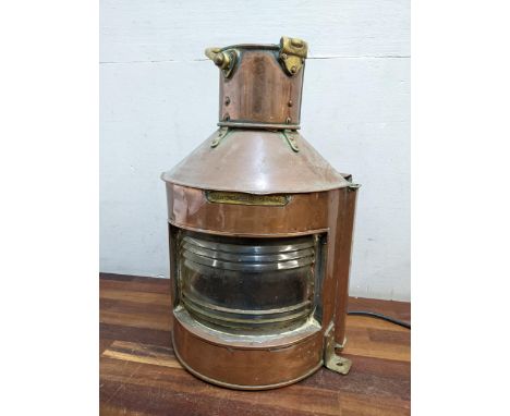 A mid 20th century copper and brass bow starboard ships lamp converted to electricityLocation: 