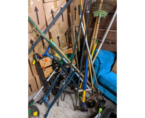 A mixed lot of garden  and other tools to include a Black and Decker folding work bench, A Qualest strimmer, and other itemsL