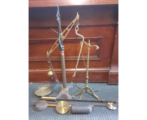 A mixed metal and clock parts lot to include brass scales and clock pendulumsLocation: 