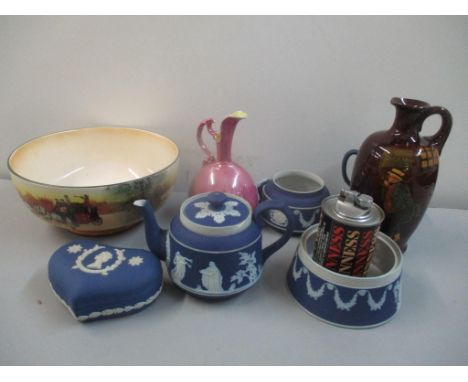 A mixed lot to include Doulton Kingsware jug, Wedgwood Jasperware, Guinness table lighter and mixed Doulton Location: FSL 