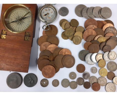 A WWI compass and a treen cased 19th century compass together with mixed coinage to include a Mercury crown silver dimeLocati