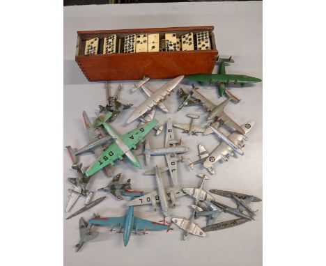 A selection of Dinky model toy planes, together with a boxed set of bone dominoes Location: 