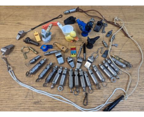 A good collection of 48 vintage whistles to include a 1920's eggcup with whistle in the form of a duck, the Acme Thunderer, T