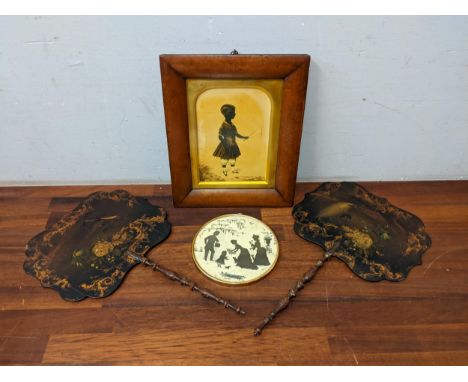Frith - a 19th century silhouette of a child with a whip and a pair of black lacquered and painted face screensLocation: 