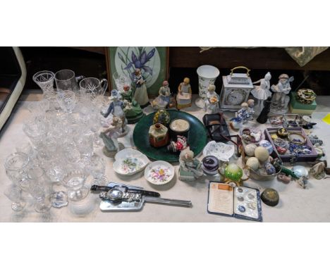 A mixed lot to include Lladro and Nao figures, costume jewellery, ornamental eggs, crystal glassware, Franklin Mint clock and