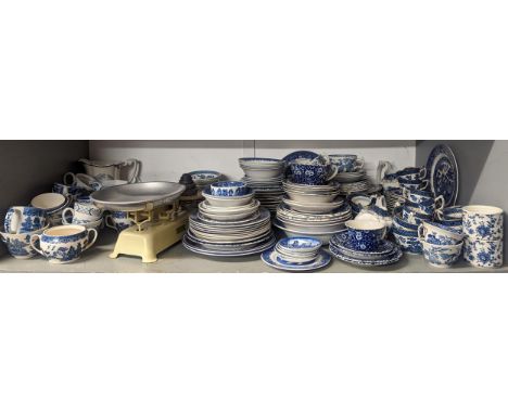 Kitchenware to include blue and white Willow pattern plates, bowls, jugs and similar ware, scales and metalware Location: 